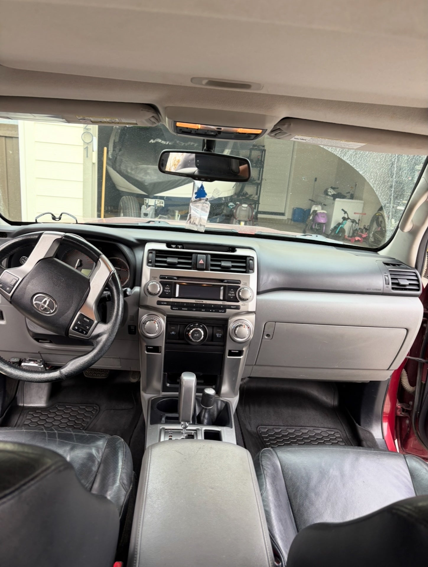 Car interior with dashboard and steering wheel visible